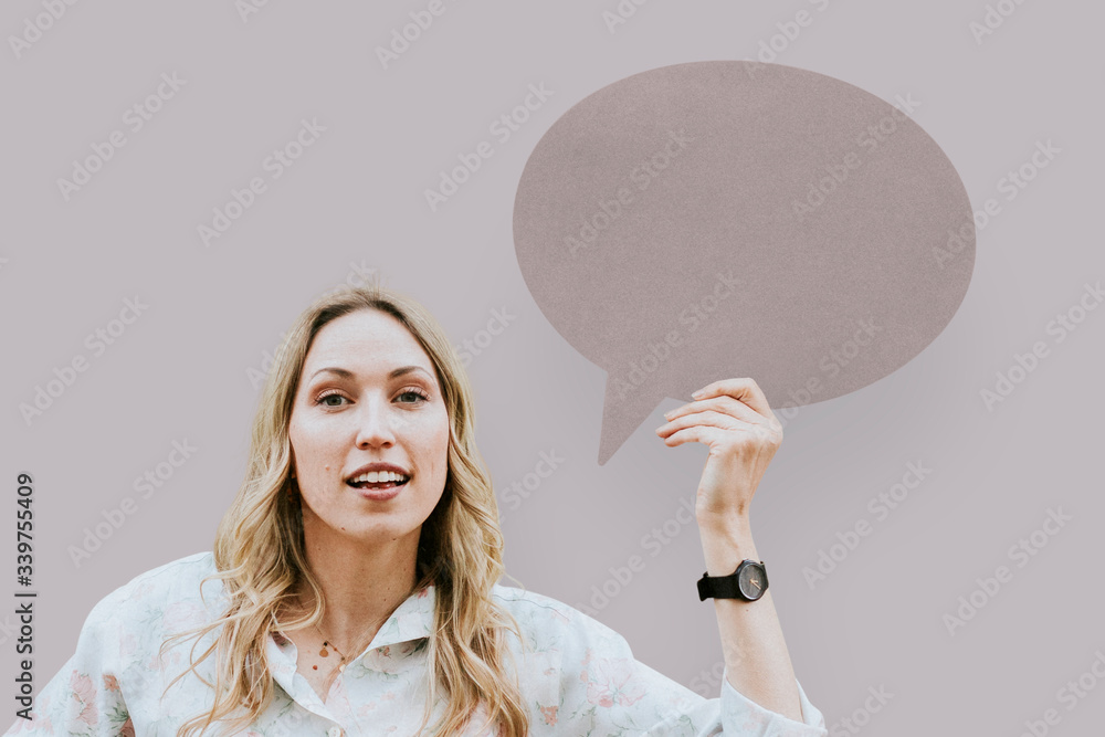 Woman holding speech bubble