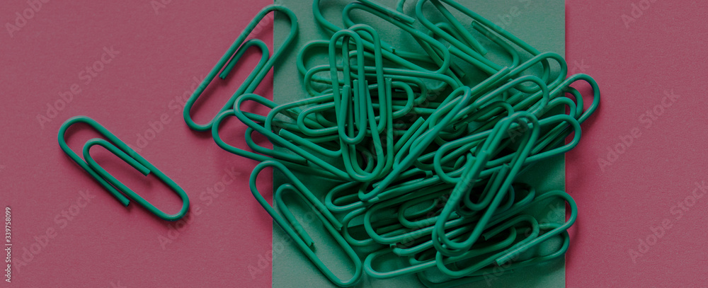 Paperclips on a piece of paper