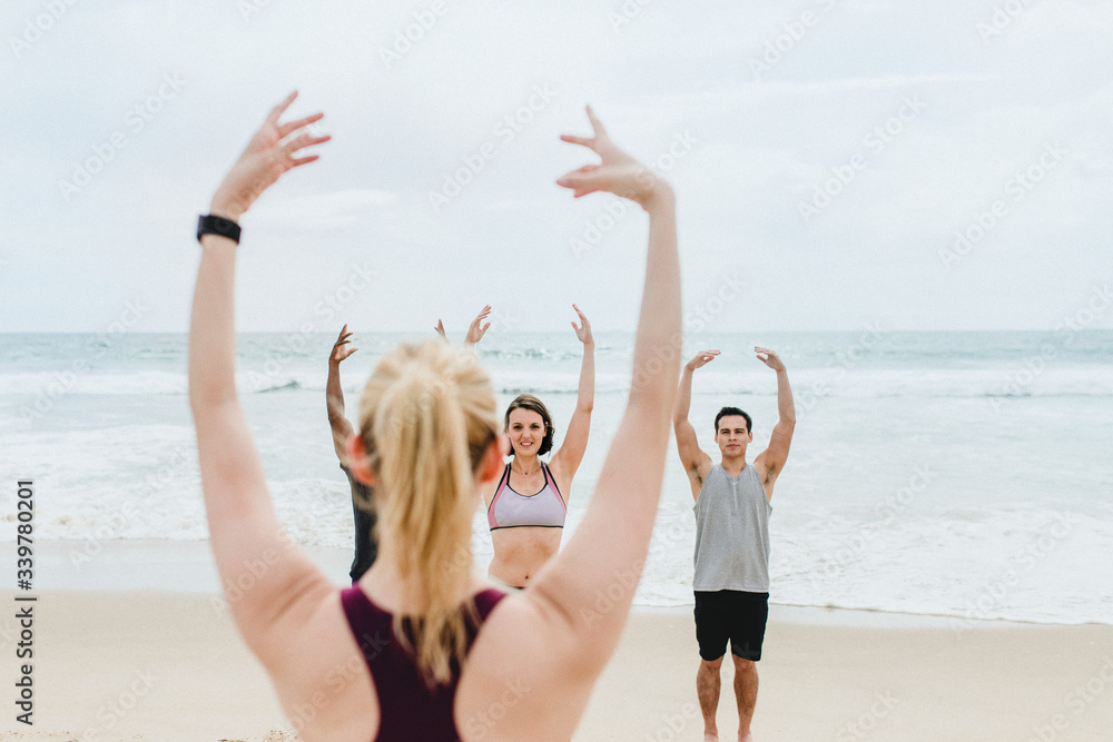 Beach yoga class