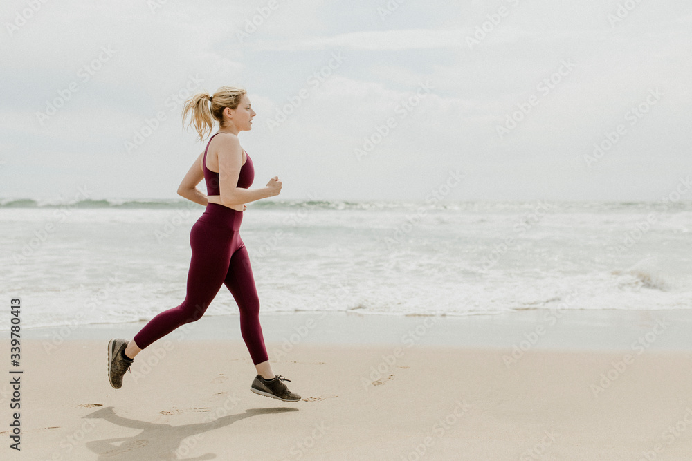 Fit woman jogging outdoors