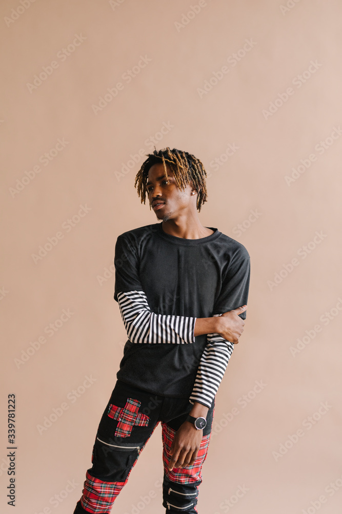 Man posing in a studio