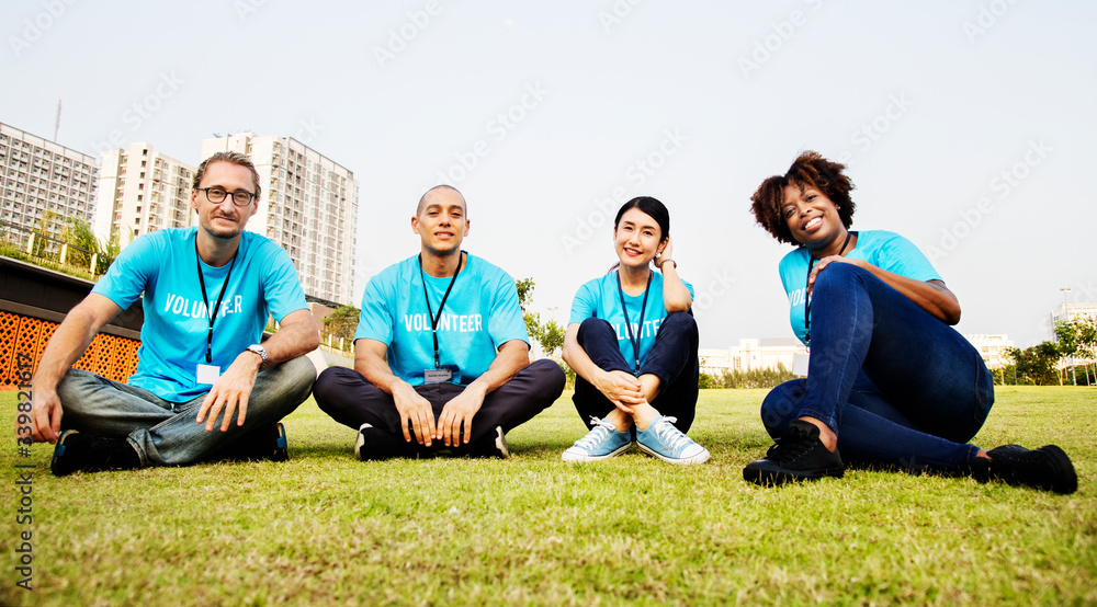 Group of happy and diverse volunteers