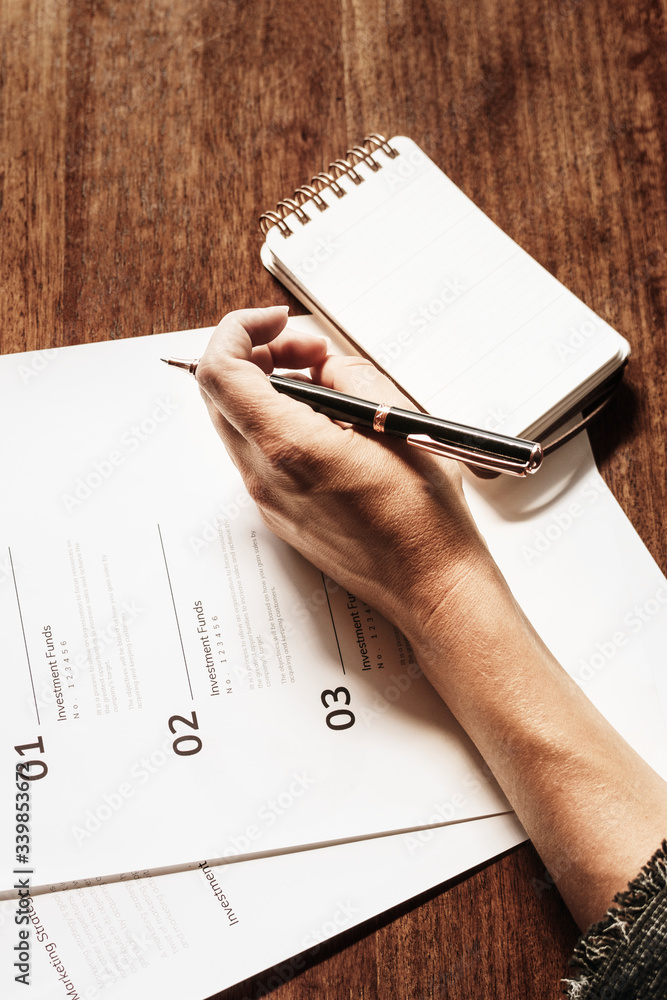 Woman taking notes