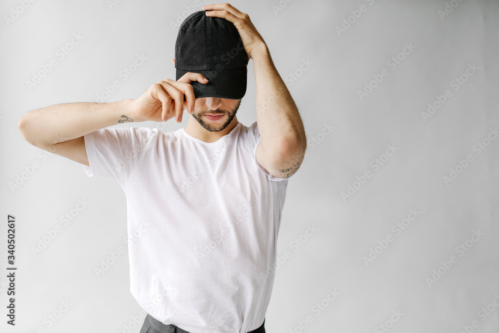 Man wearing a black cap