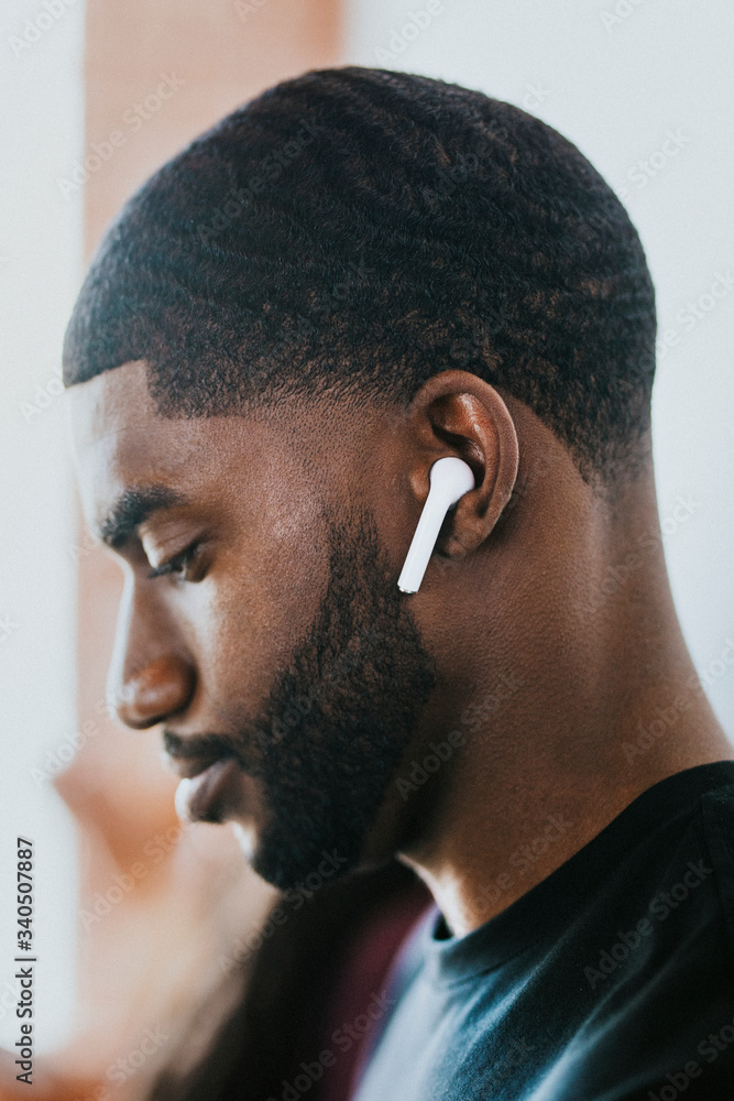 Black man listening to music