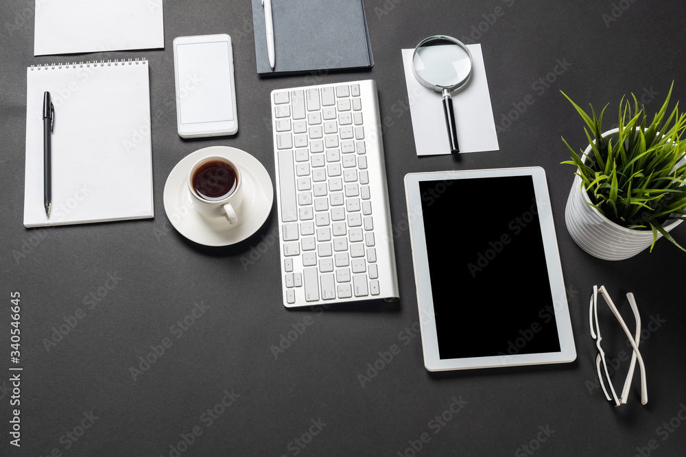 Top view of workplace with digital devices