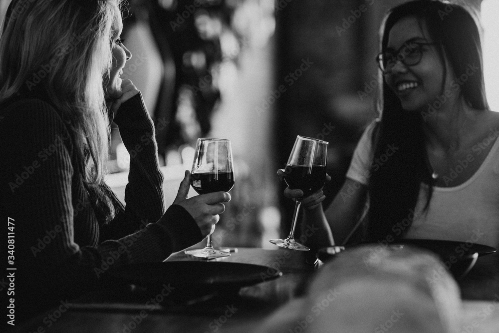 Friends drinking wine together