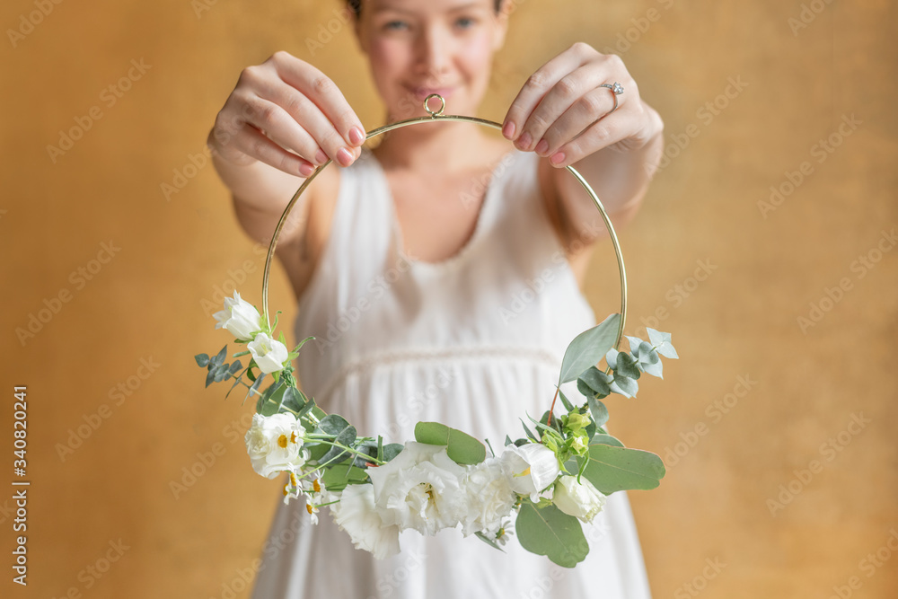 Bride holding a frame