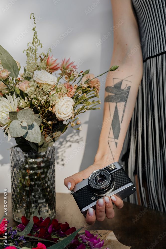 Girl with an analog camera