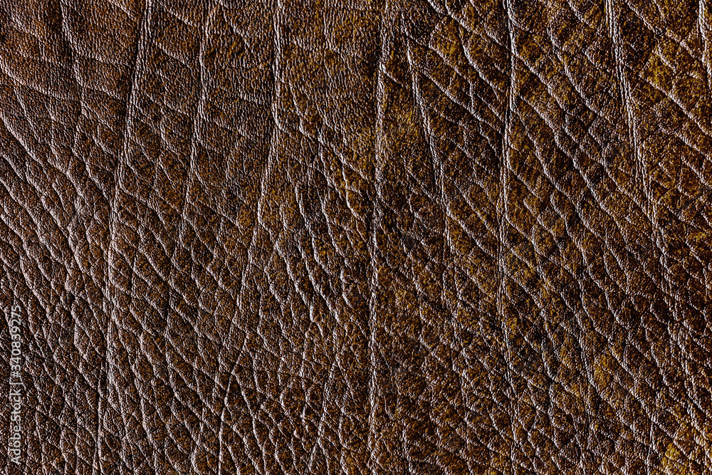 Brown creased leather textured background