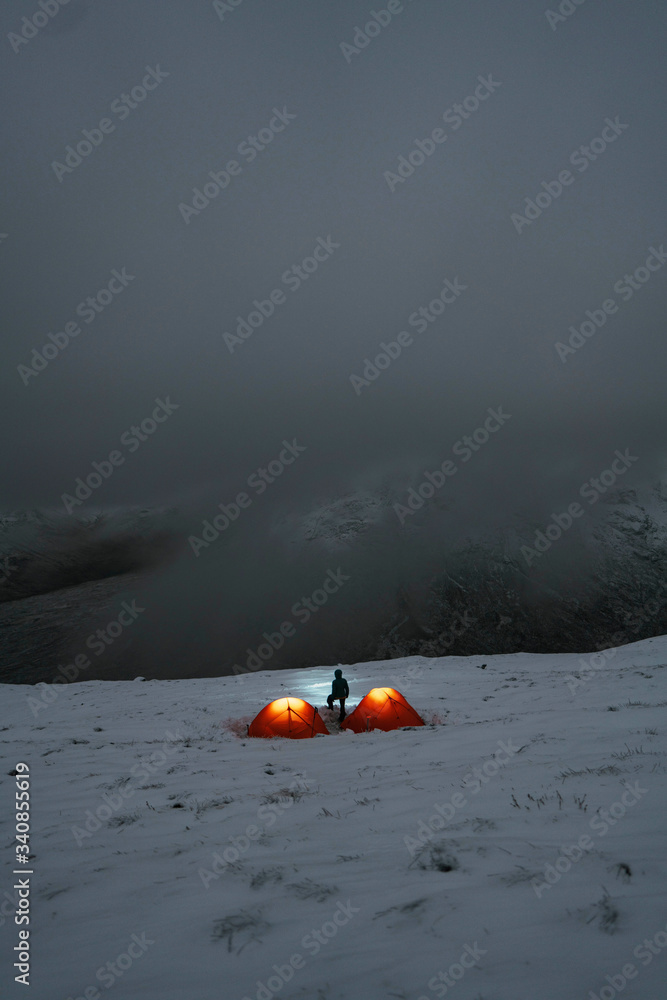 Camping in a tent during winter