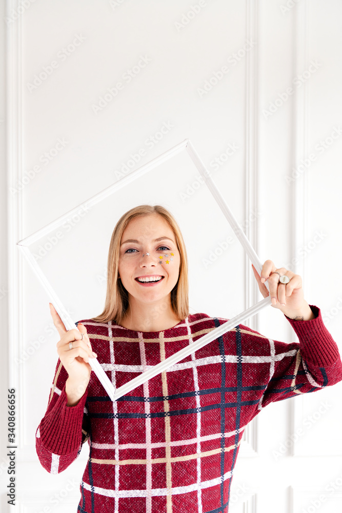 Woman holding a frame