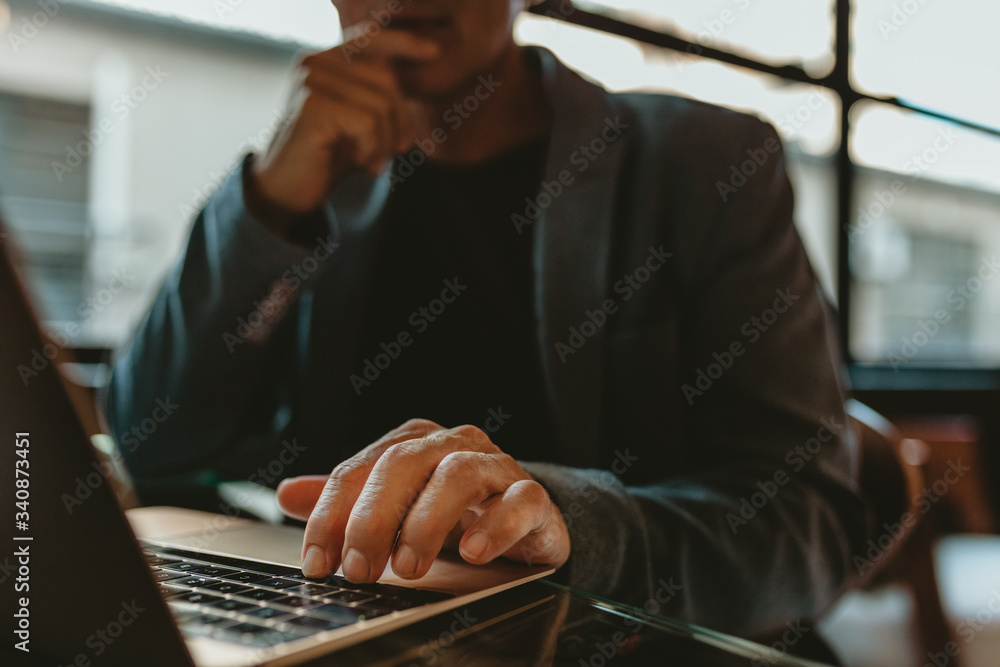 Businessman working on laptop