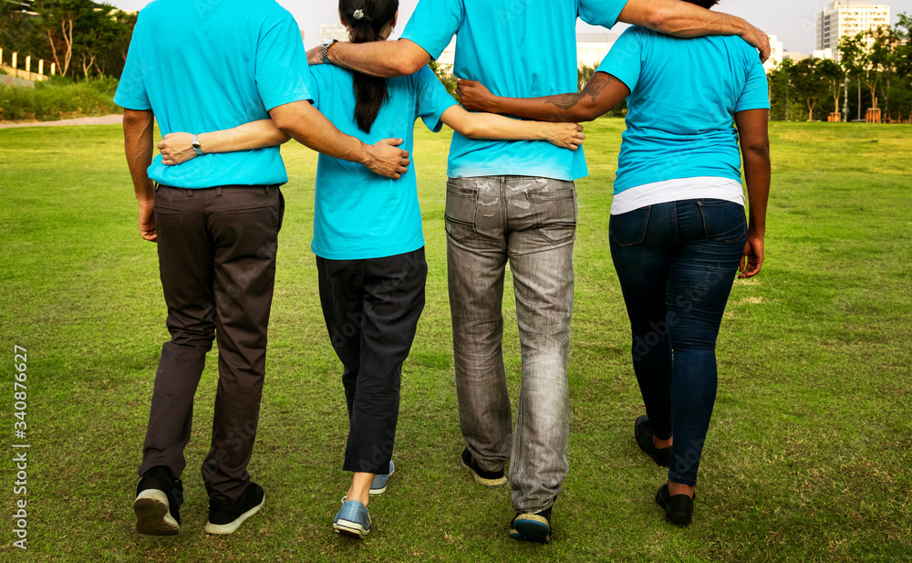 Group of happy and diverse volunteers