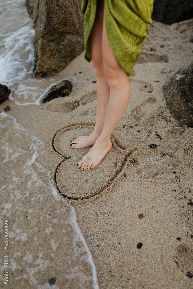 A heart drawn in the sand