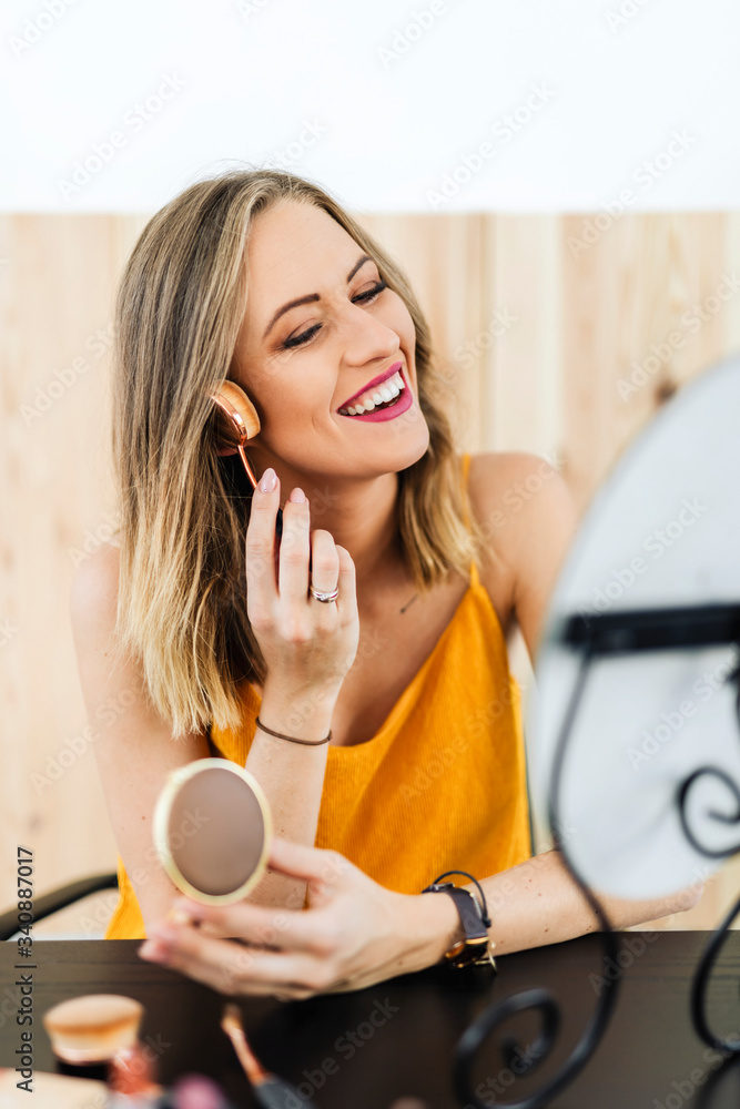 Woman applying powder