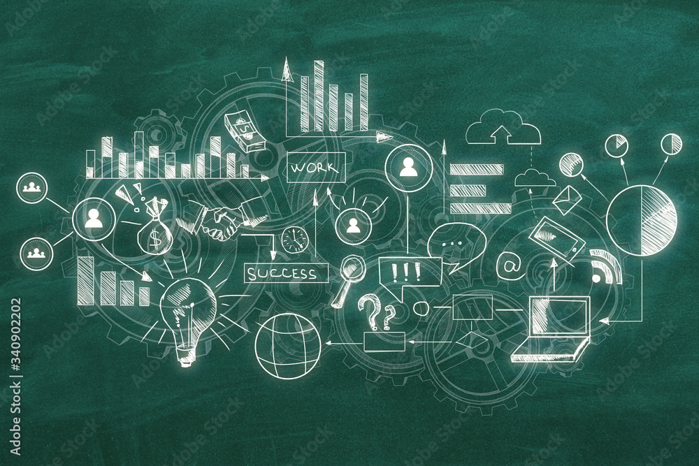 Drawing charts and business concept on green blackboard.