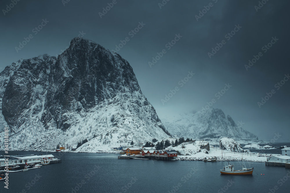 Snowy fishing village at Moskenesøya island, Norway