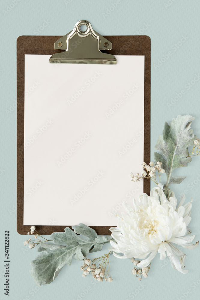 Clipboard with copy space and flowers