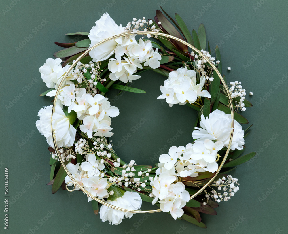 White floral macrame wreath with golden hoop