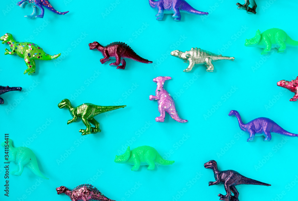 Various animal toy figures in a colorful background