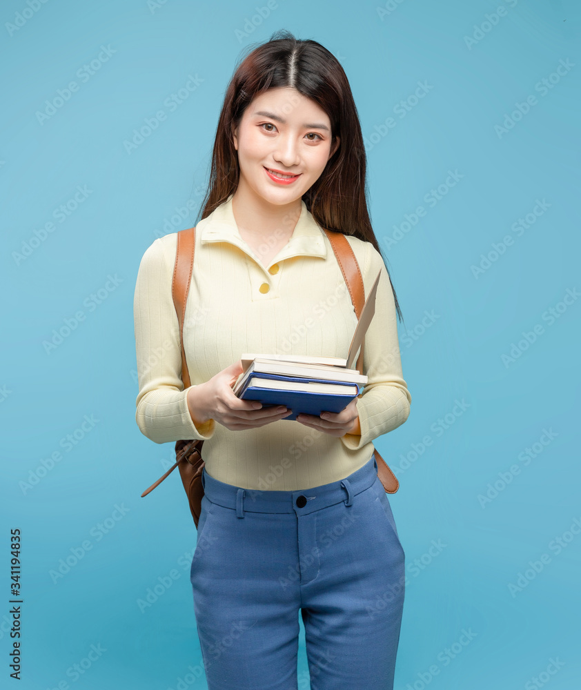 Asian girl on blue background

