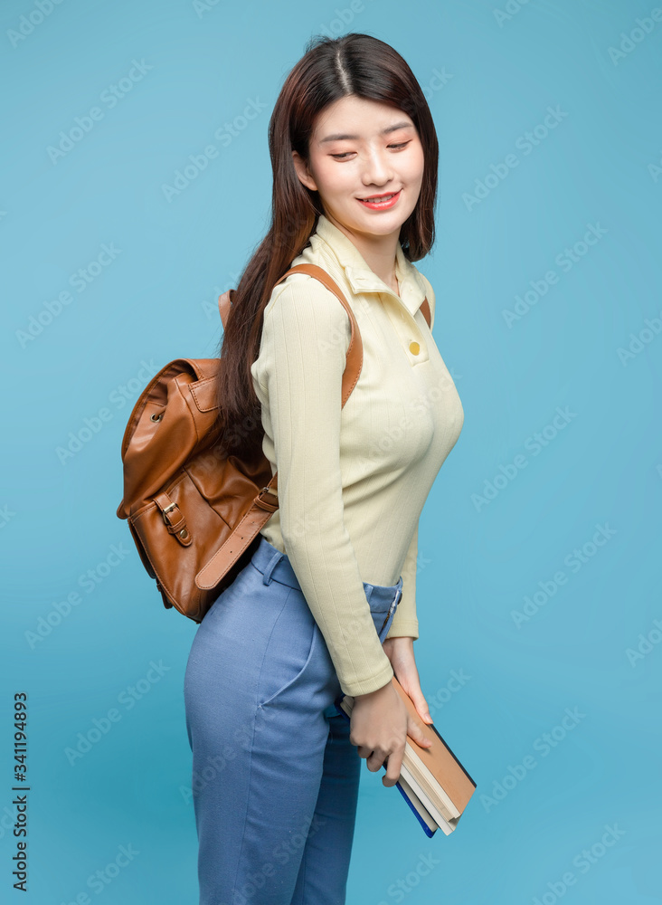 Asian girl on blue background

