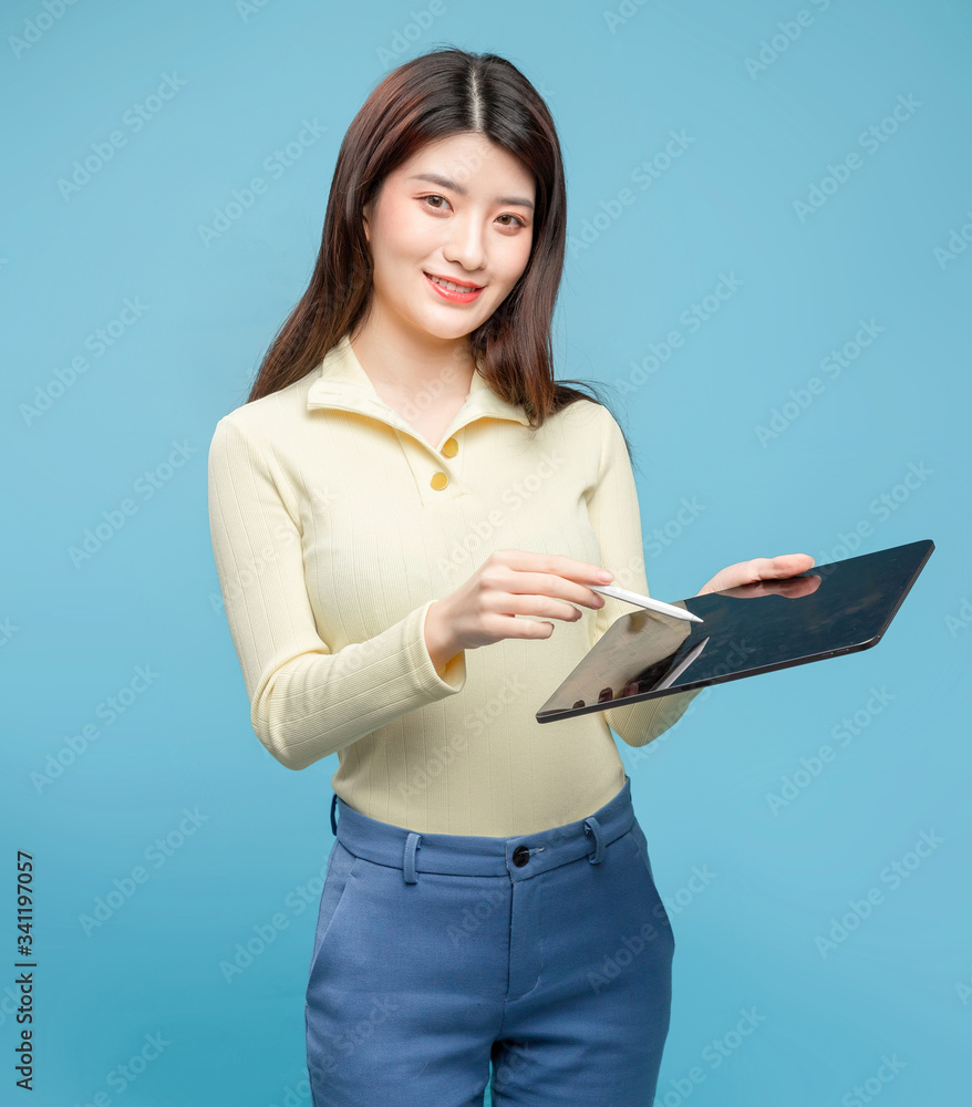 Asian girl on blue background

