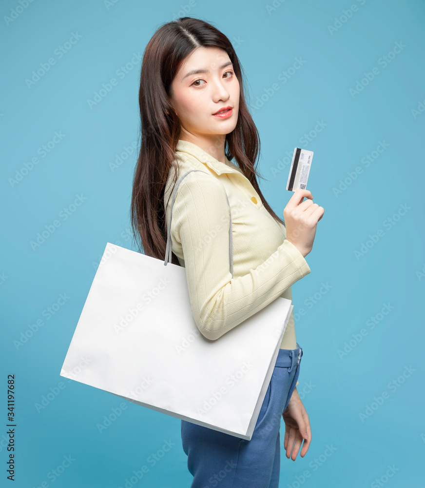 Asian girl on blue background

