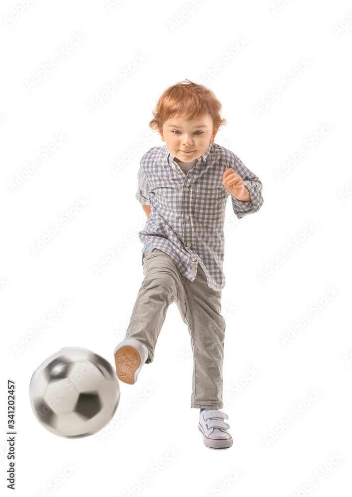 Cute little boy with soccer ball on white background