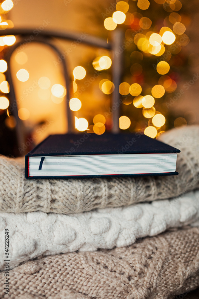 Book on top of a sweater