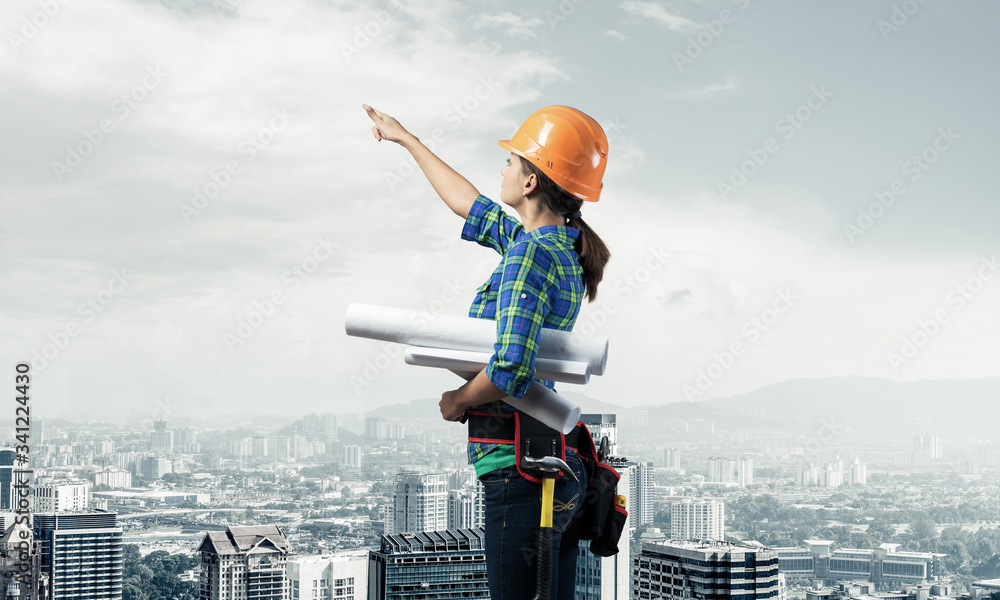 Woman architect in checkered blue shirt