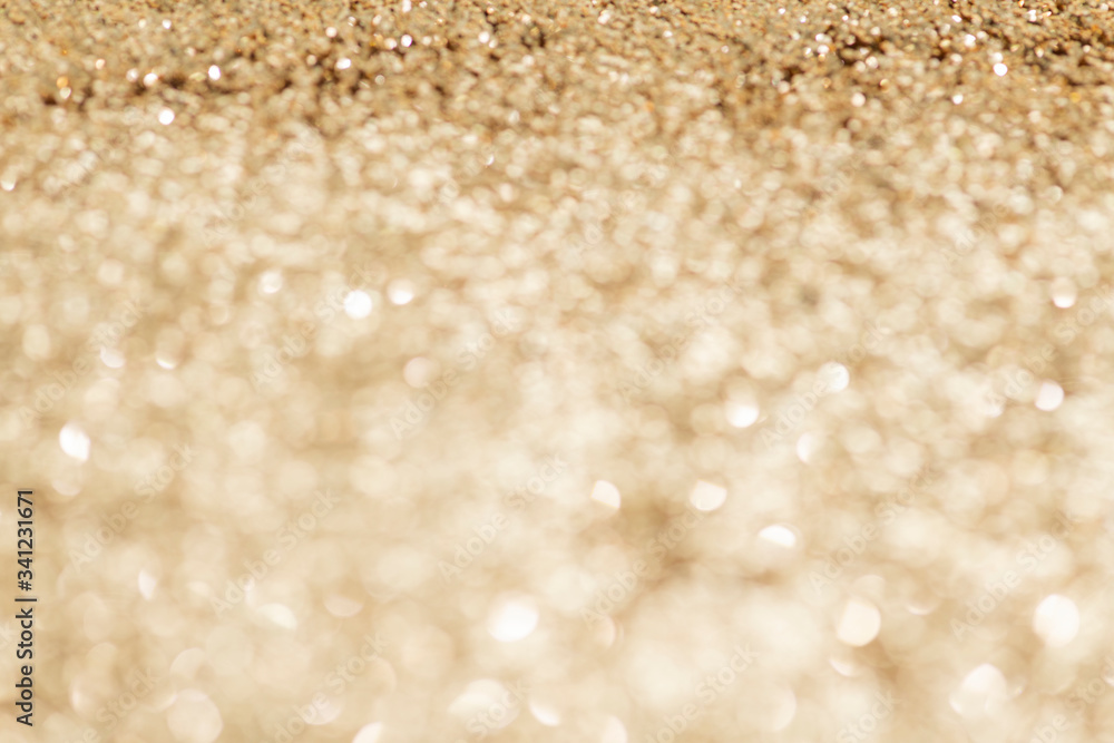 Shiny golden glitter background texture