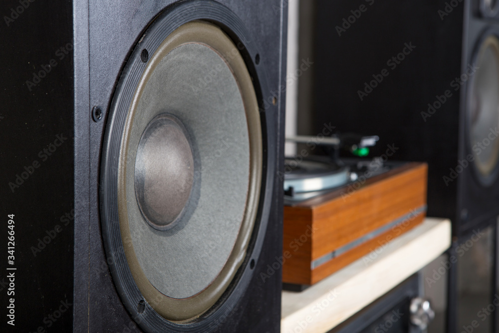 HiFi system with turntable, amplifier and speakers in a studio