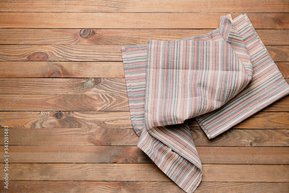 Clean napkins on wooden background