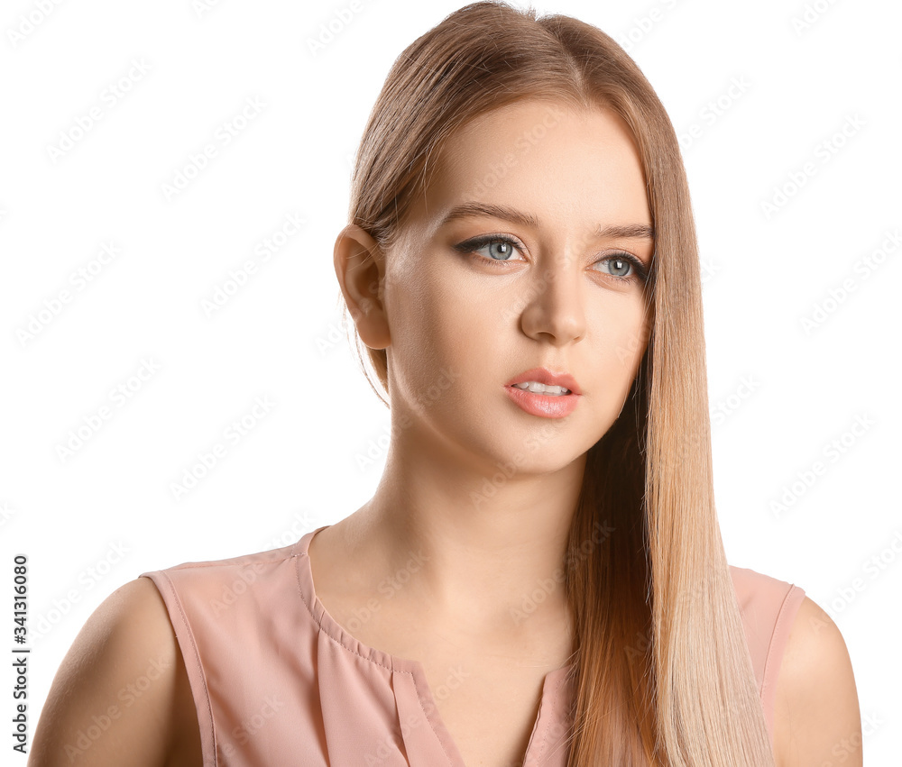 Young blonde with beautiful hair on white background