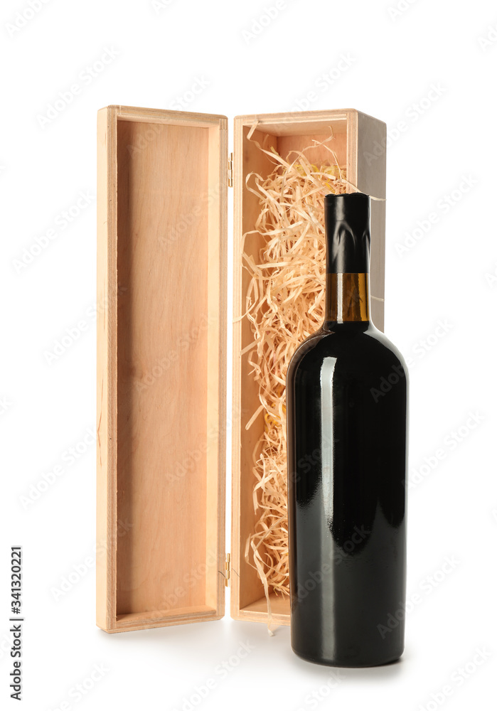 Box with bottle of wine on white background