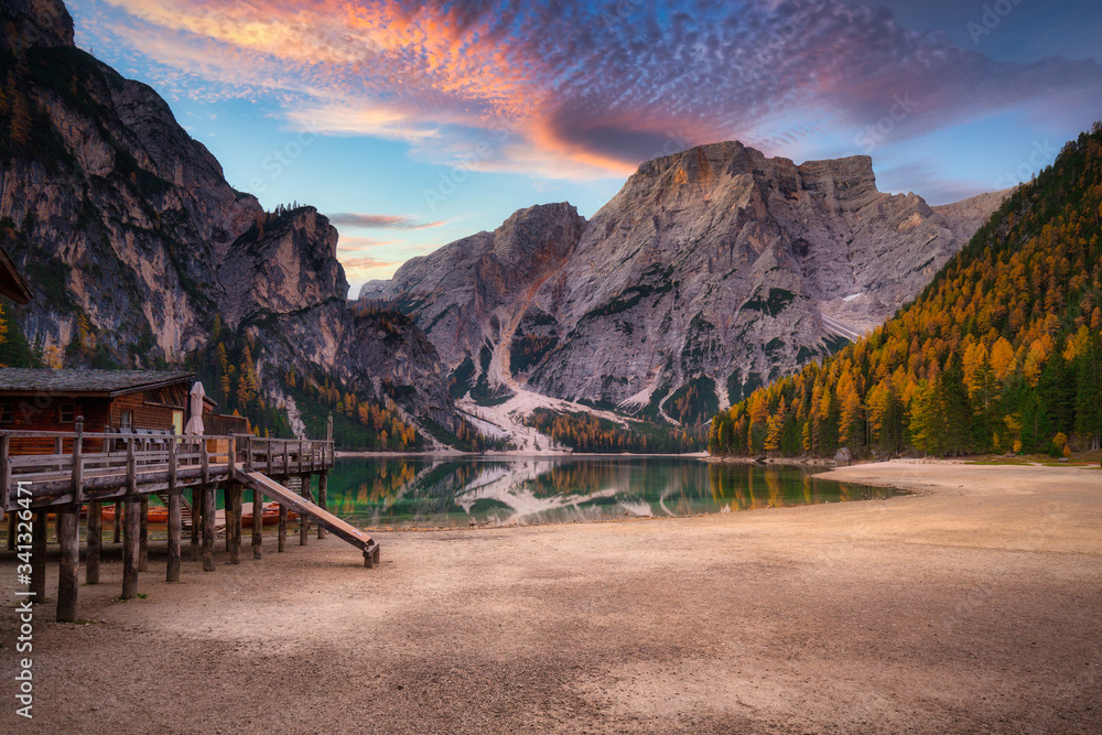 Lago di Braies lake and Seekofel peak at sunrise, Dolomites. Italy