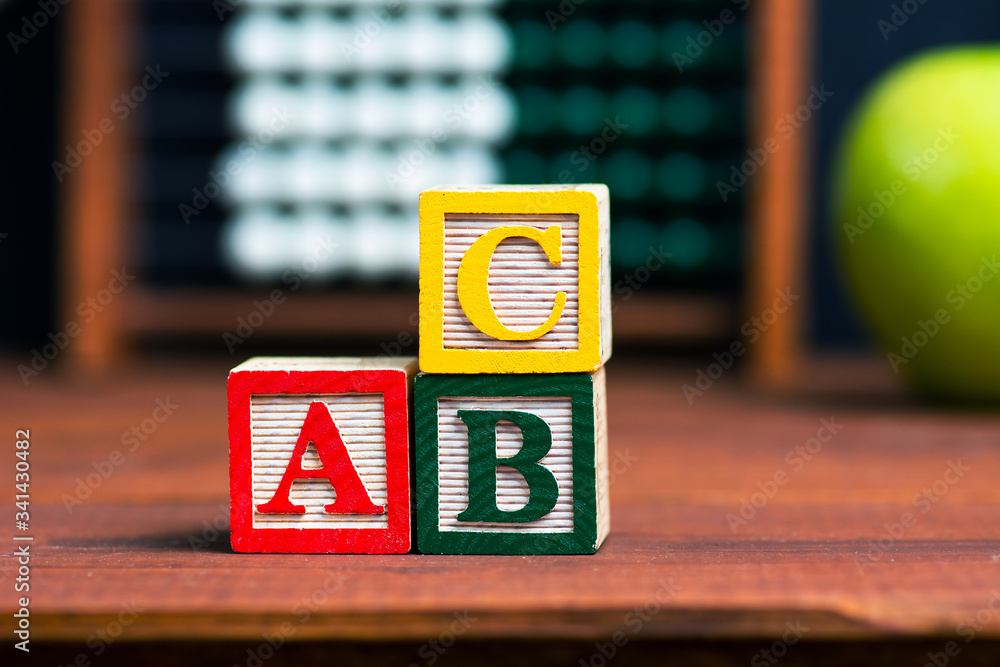 Alphabet and education abstract in front of the blackboard