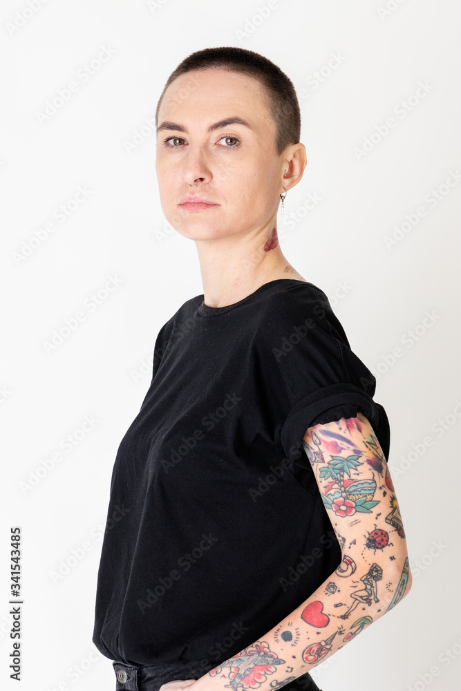 Cool tattooed skinhead woman