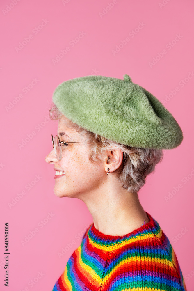 Side view of a cute cheerful woman