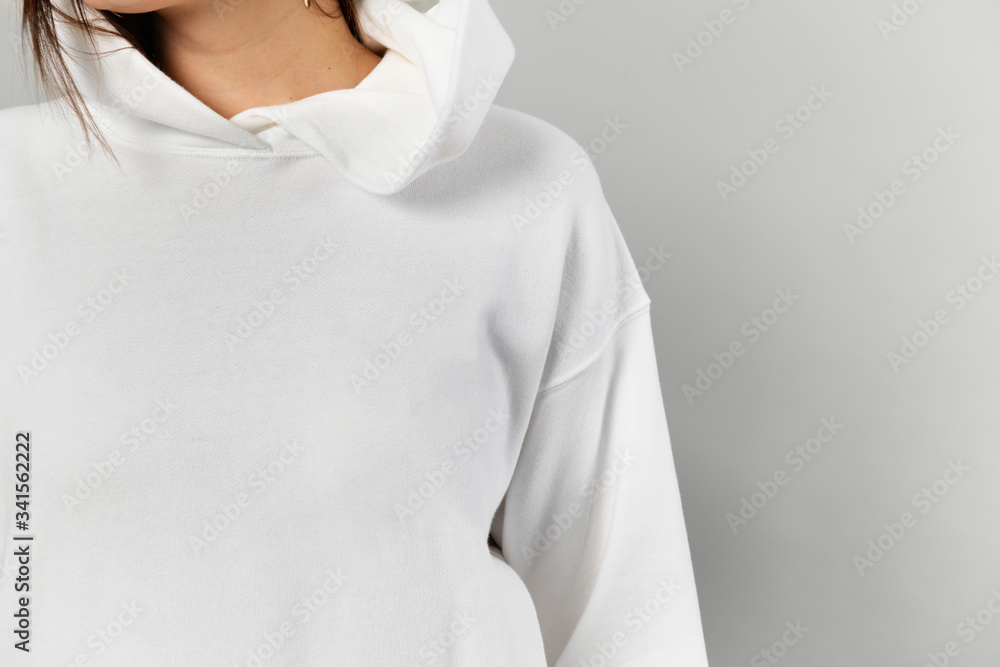 Woman in a white hoodie