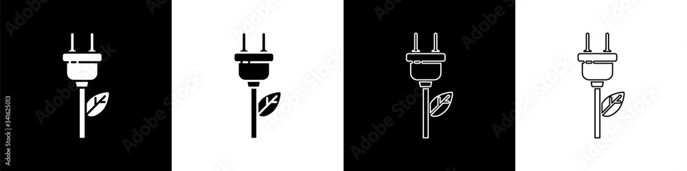 Set Electric saving plug in leaf icon isolated on black and white background. Save energy electricit