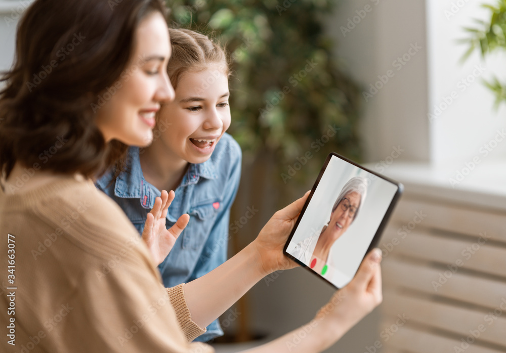 family are talking with grandma