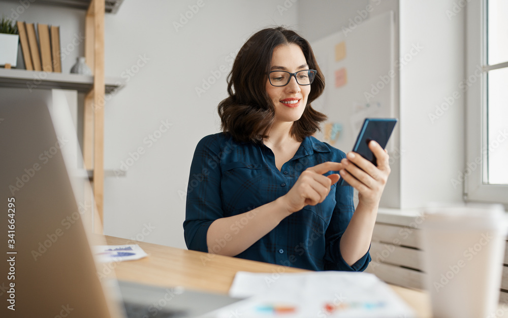 young woman using tablet computer at home