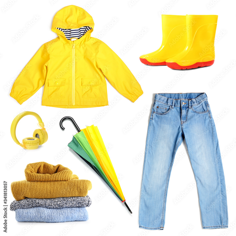 Set of stylish child clothes and accessories on white background