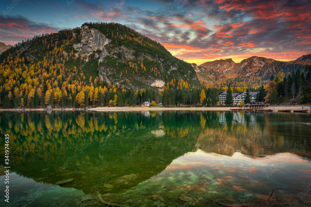 Lago di Braies lake in Dolomites at sunrise, Italy