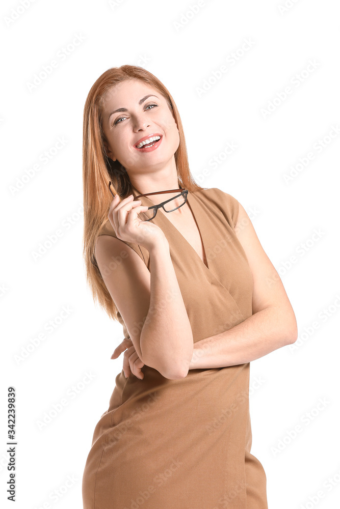 Portrait of beautiful young businesswoman on white background