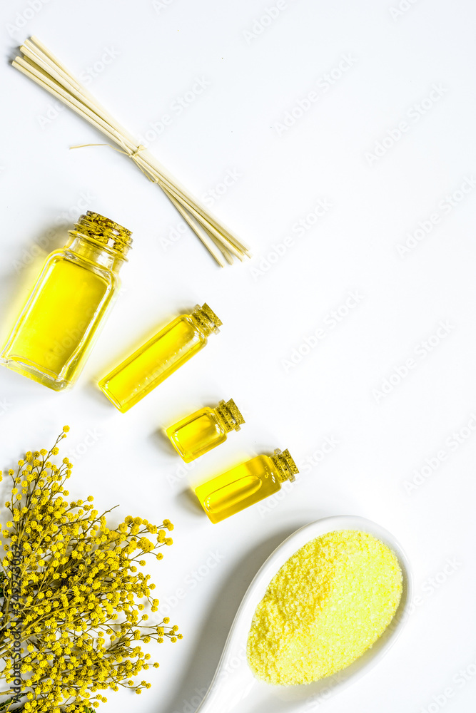 Cosmetic set with oil and salt on white background top view mockup