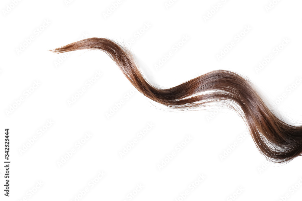 Strand of beautiful curly hair on white background